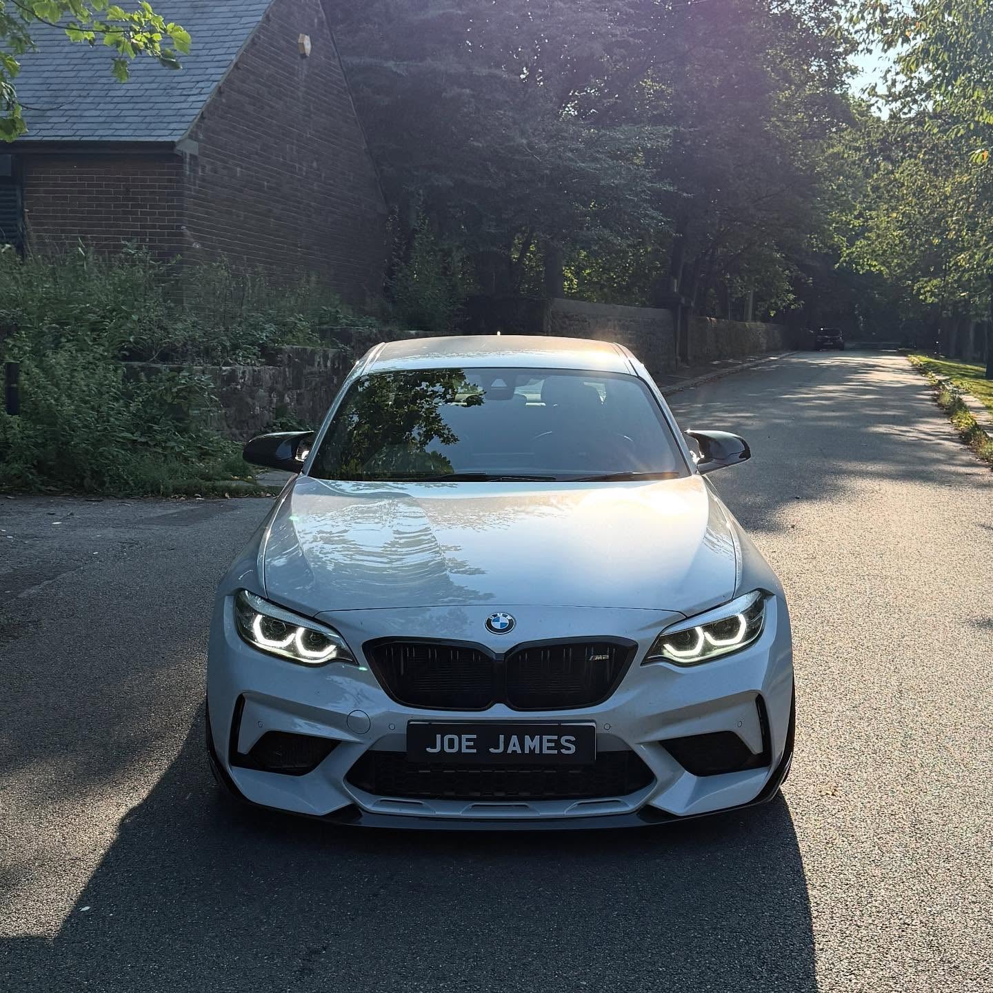 BMW M2 Competition F87 Lip Anteriore Stile Performance in Carbonio Prepreg Nero Lucido di OPTIC (2018-2021)