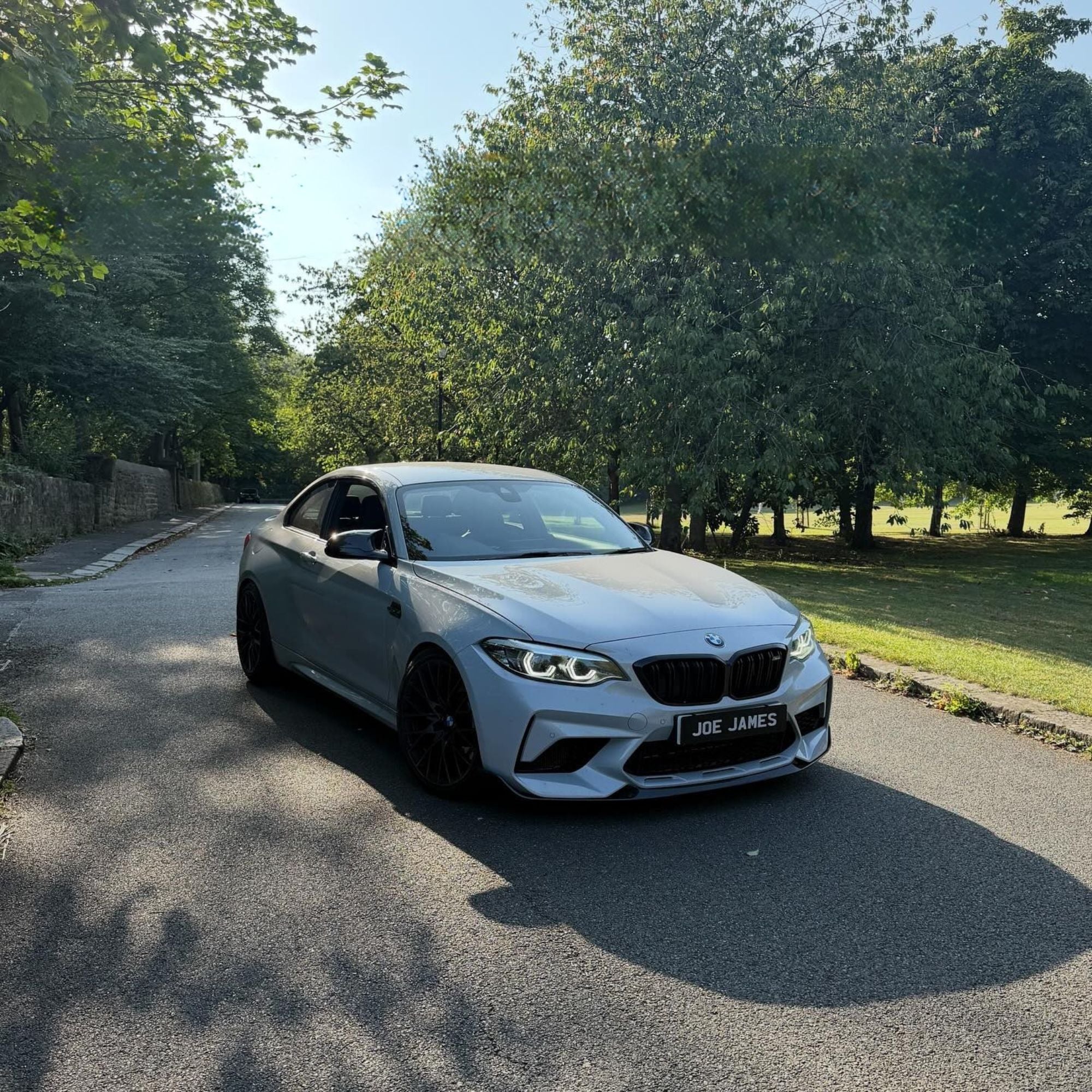 BMW M2 Competition F87 Lip Anteriore Stile Performance in Carbonio Prepreg Nero Lucido di OPTIC (2018-2021)